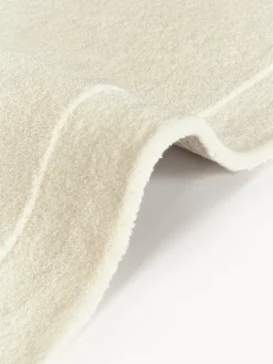 Alfombra artesanal de lana en forma orgánica Kadey