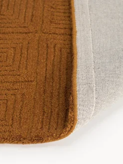 Alfombra artesanal de lana con estampado geométrico Alexia