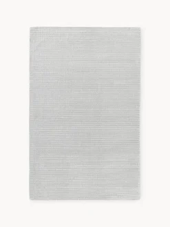 Alfombra artesanal de pelo largo texturizada Wes