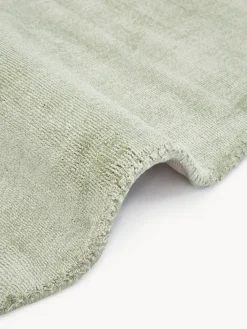 Alfombra redonda artesanal de viscosa Jane