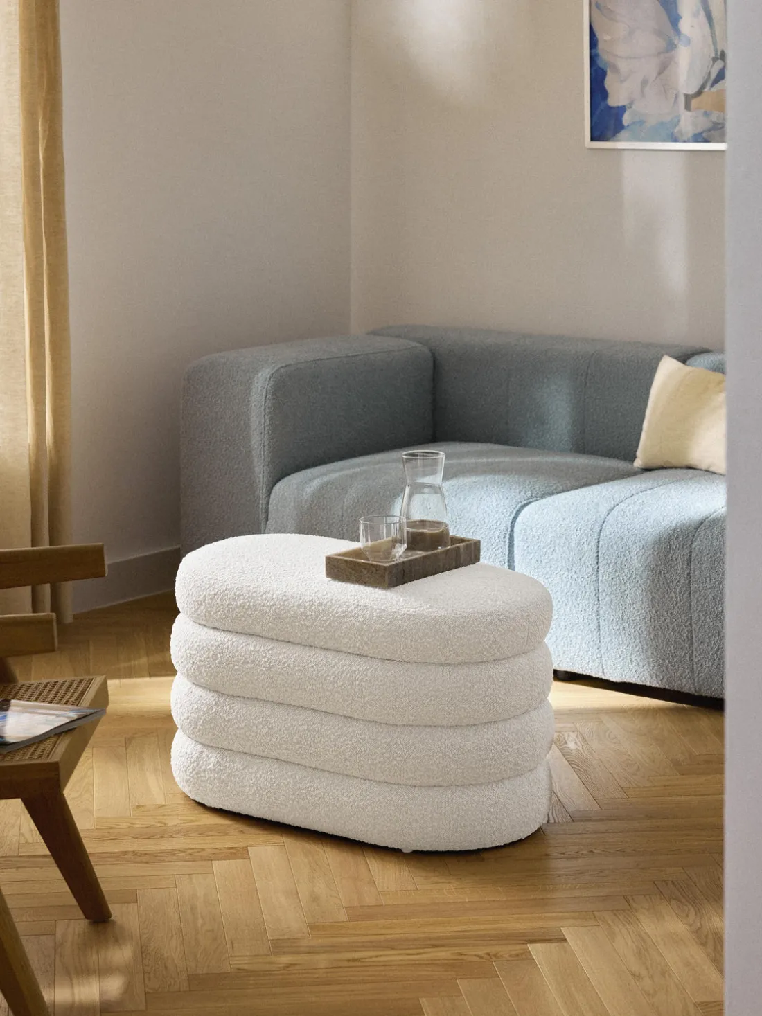 Banco pequeño tapizado en tejido bouclé con espacio de almacenamiento Alto