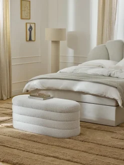 Banco tapizado en tejido bouclé con espacio de almacenaje Alto