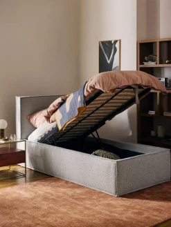 Cama individual tapizada en tejido bouclé con espacio de almacenamiento Dream