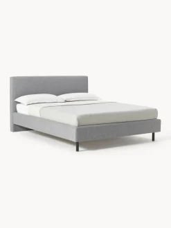 Cama tapizada con patas de madera Giulia