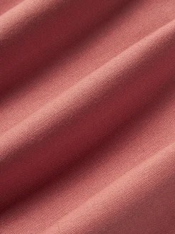 Cojín artesanal con mechones decorativos Cleo