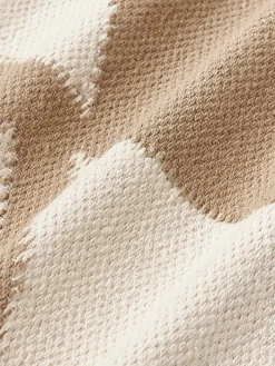 Cojín grande artesanal con motivos geométricos Asta