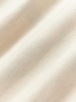 Cojín grande artesanal con motivos geométricos Asta