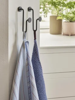 Colgador de metal Swing