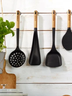 Espumadera con mango de madera de acacia Cook