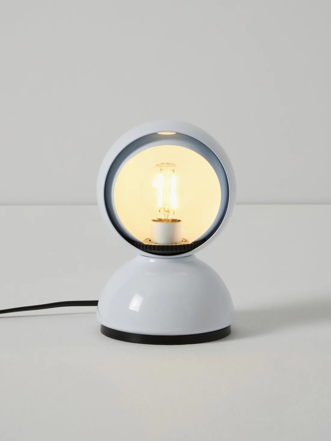 Lámpara de mesa pequeña regulable Eclisse