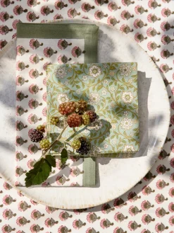 Mantel artesanal con estampado floral Melon