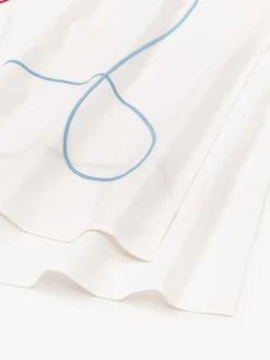 Mantel con bordado abstracto Sue