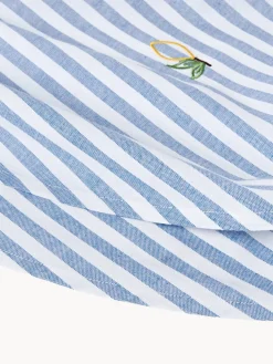 Mantel redondo a rayas con motivos bordados Melony