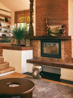 Mesa auxiliar redonda artesanal de cerámica Currents