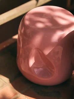 Mesa auxiliar redonda artesanal de cerámica Currents