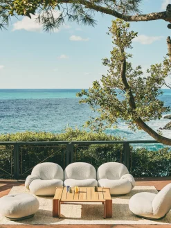 Puf giratorio de exterior en tejido de bouclé Pacha