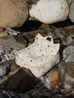 Puf infantil artesanal en tejido bouclé Sugar