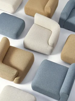 Puf reposapiés en tejido bouclé Sofia