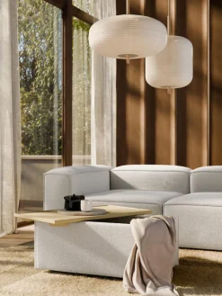 Reposapiés puf en tejido bouclé con espacio de almacenamiento Lennon