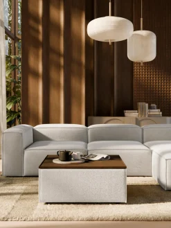 Reposapiés puf en tejido bouclé con espacio de almacenamiento Lennon