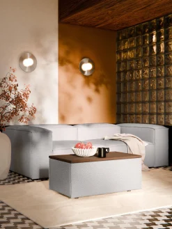 Reposapiés puf en tejido bouclé con espacio de almacenamiento Lennon