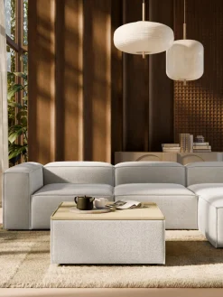 Reposapiés puf en tejido bouclé con espacio de almacenamiento Lennon