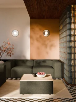 Reposapiés puf en tejido bouclé con espacio de almacenamiento Lennon