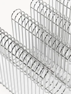 Revistero de metal Curva