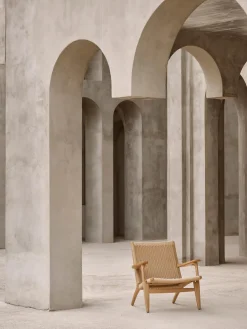 Sillón con asiento y respaldo tejidos a mano CH25