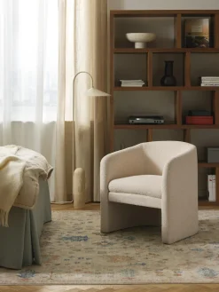 Sillón en tejido bouclé Mairo