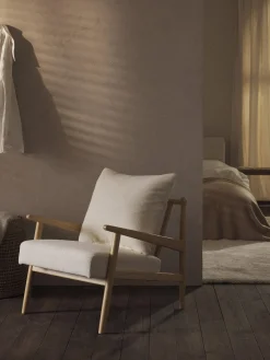 Sillón en tejido bouclé Mikkel