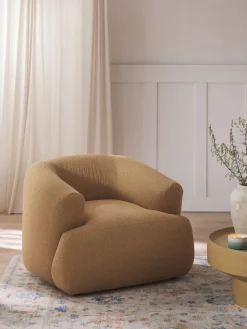 Sillón en tejido bouclé Sofia