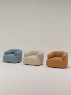 Sillón en tejido bouclé Sofia