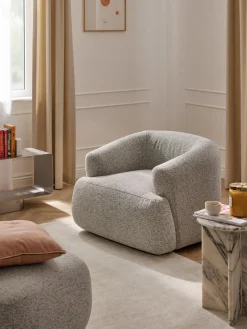 Sillón en tejido bouclé Sofia