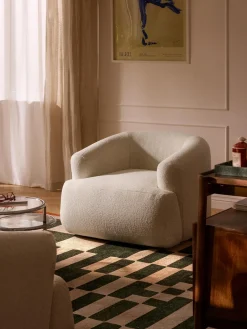 Sillón en tejido bouclé Sofia