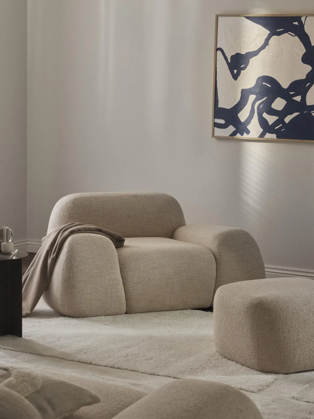 Sillón en tejido bouclé Wolke