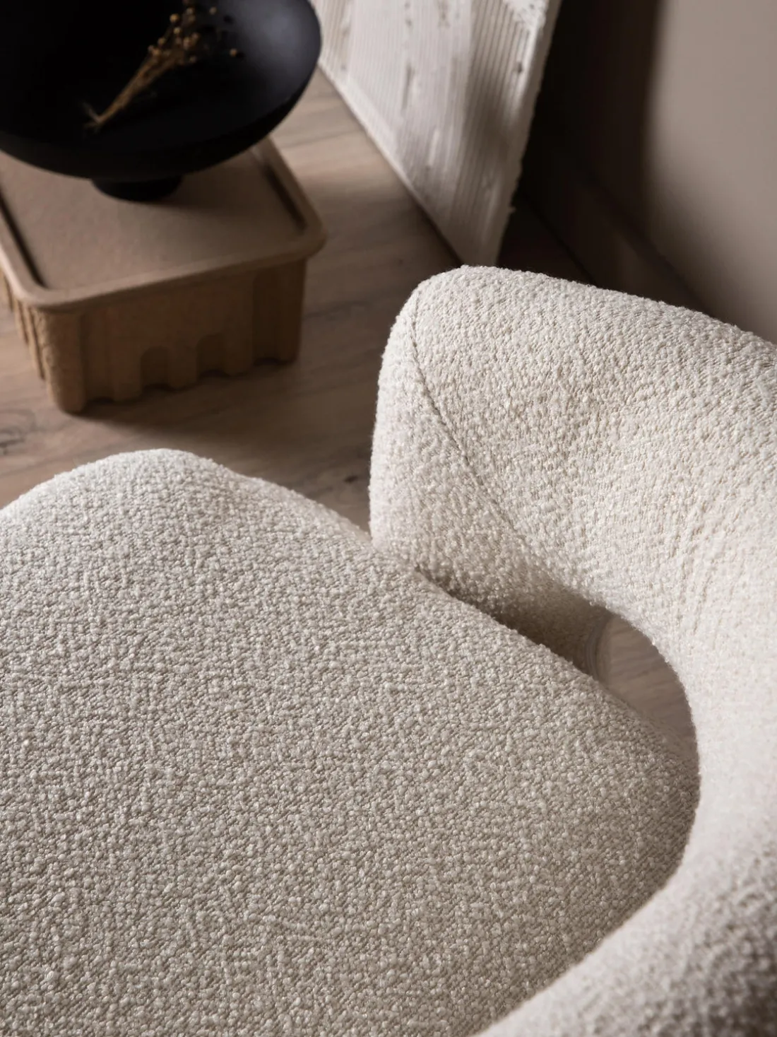 Sillón giratorio en tejido bouclé Laurel