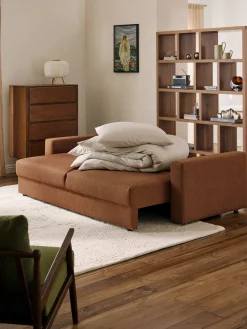 Sofá cama en tejido bouclé Tasha (3 plazas), con espacio de almacenamiento