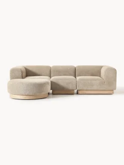 Sofá modular de borreguillo bouclé con reposapiés Natalie (3 plazas, izquierda/derecha)