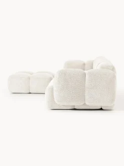 Sofá modular de borreguillo bouclé con reposapiés Tayla (4 plazas)