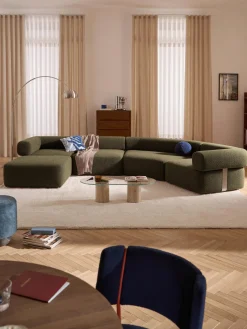 Sofá modular grande en tejido bouclé con reposapiés Anton (izquierda/derecha)