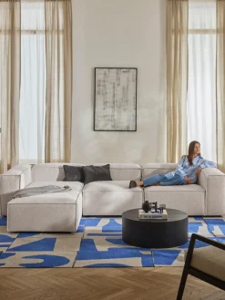 Sofá rinconera modular en tejido bouclé con reposapiés izquierdo/derecho Lennon (4 plazas)