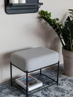 Taburete tapizado en tejido bouclé con estante Milou